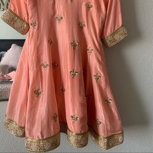 Light peach heavy Lehnga with Anarkali. hand embroidery all over. Pure silk.